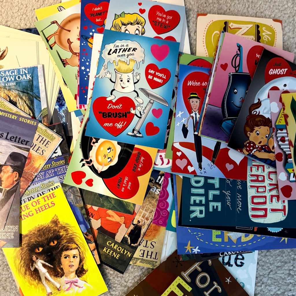 a large pile of novelty postcards